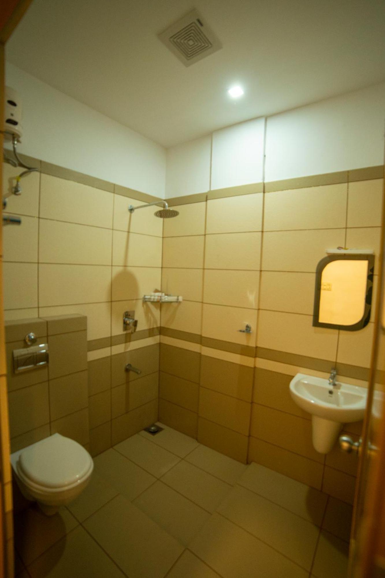 Opm Inn Payyannur Εξωτερικό φωτογραφία